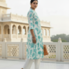 Off white kurta set with teal floral design